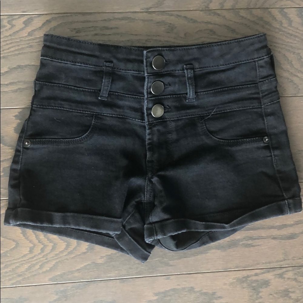 High waisted black jean shorts.